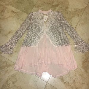 Tell tale lace mini dress